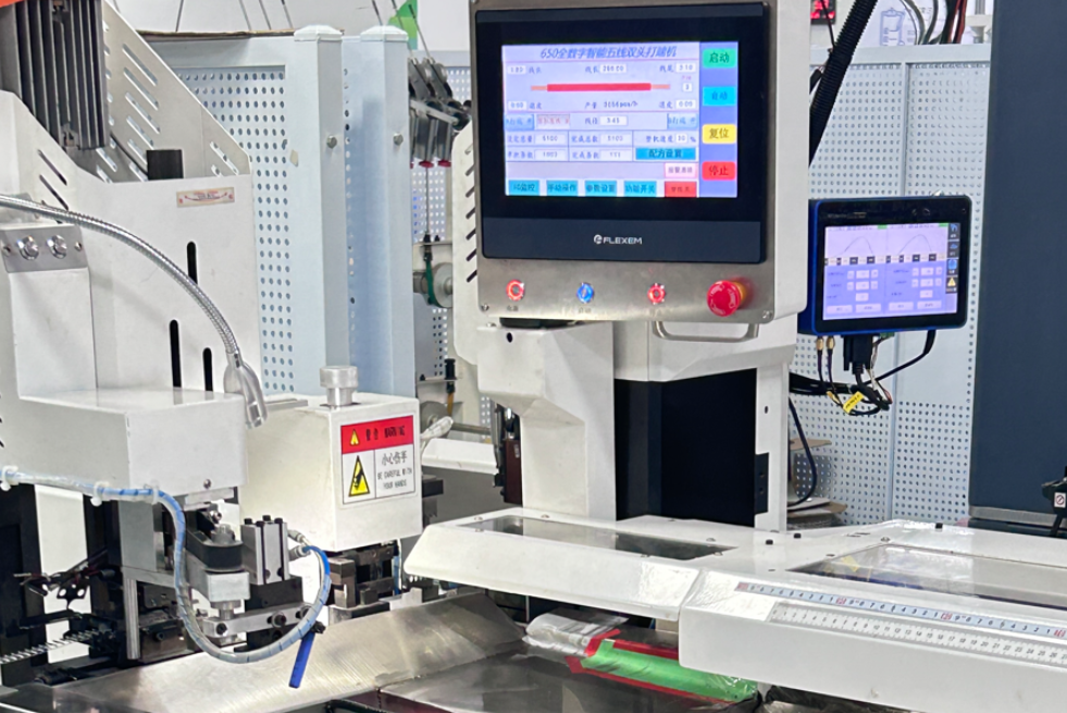 WireAssyTech quality technician conducting 100% electrical testing on custom cable assemblies